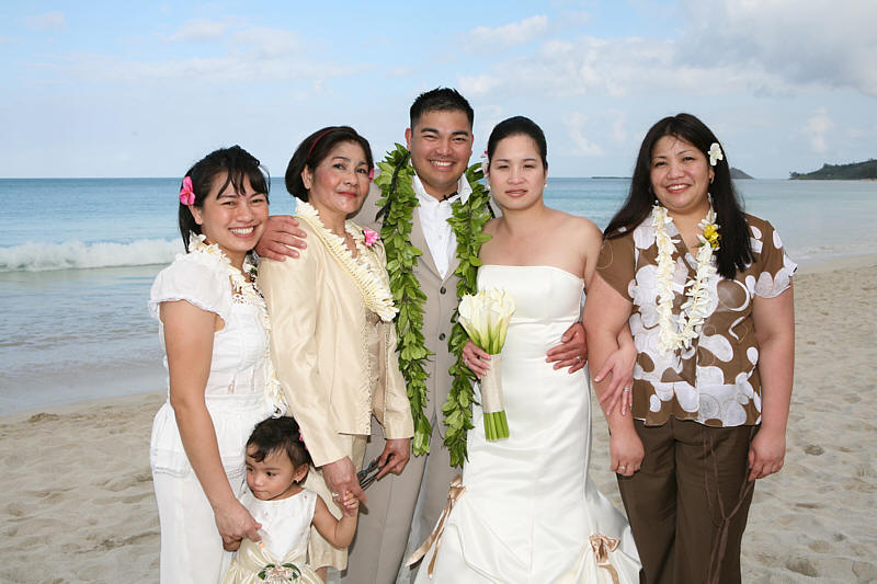 Wedding after their beach ceremony with mom and family
